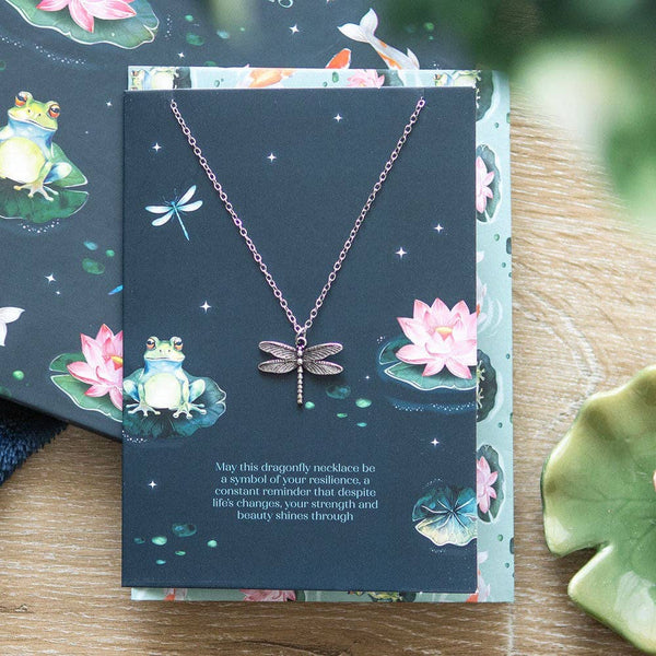 Dragonfly necklace on greeting card