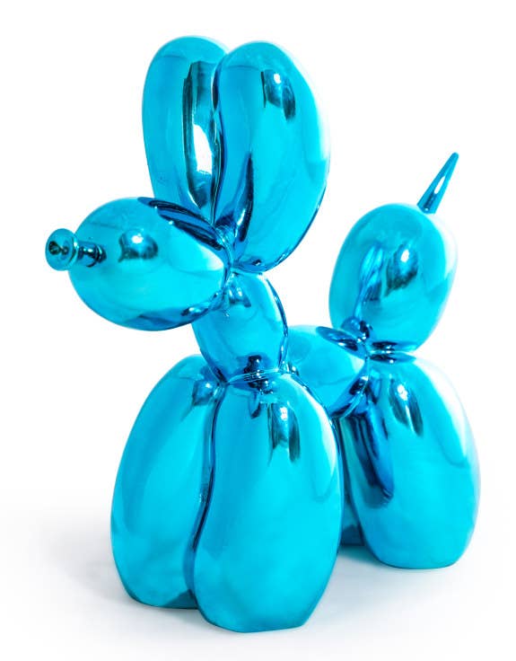 Large decorative figurine of a dog with a blue electric balloon.
