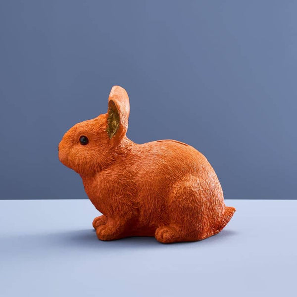 Thrifty rabbit, orange polyurethane resin, 21 x 11 x 16 cm