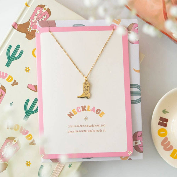 Cowboy boot necklace on greeting card