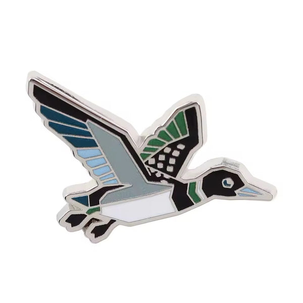 Pin’s Canard Colvert en vol
