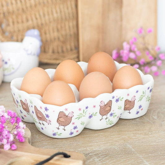 Ceramic egg holder with floral hen design