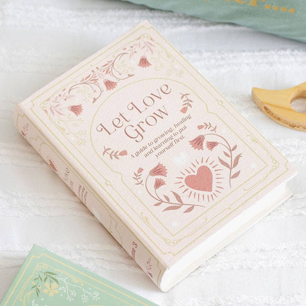 Pink book-shaped storage box