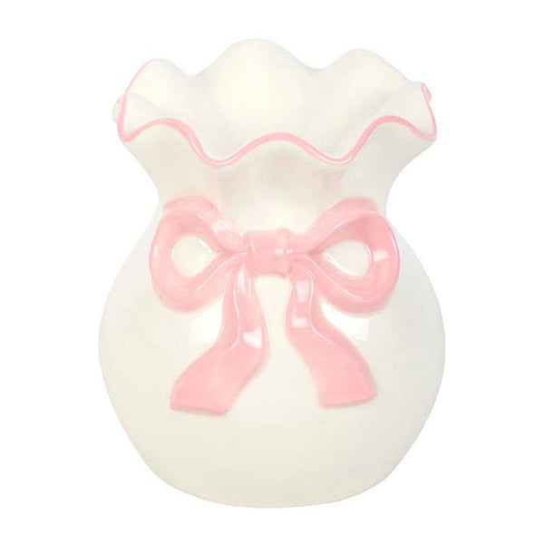 White and pink oil burner with bow