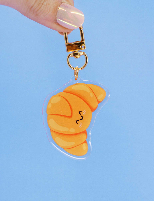 Porte-clés acrylique Croissant Kawaii – Boulangerie française | Joanna Behar – vue 1