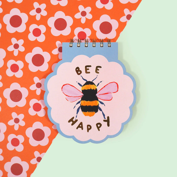 Notebook in the shape of a happy bee