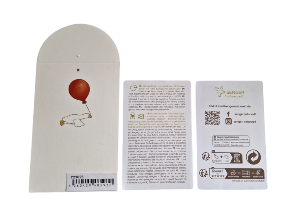 Small hot water bottle in the shape of a cuddly white goose