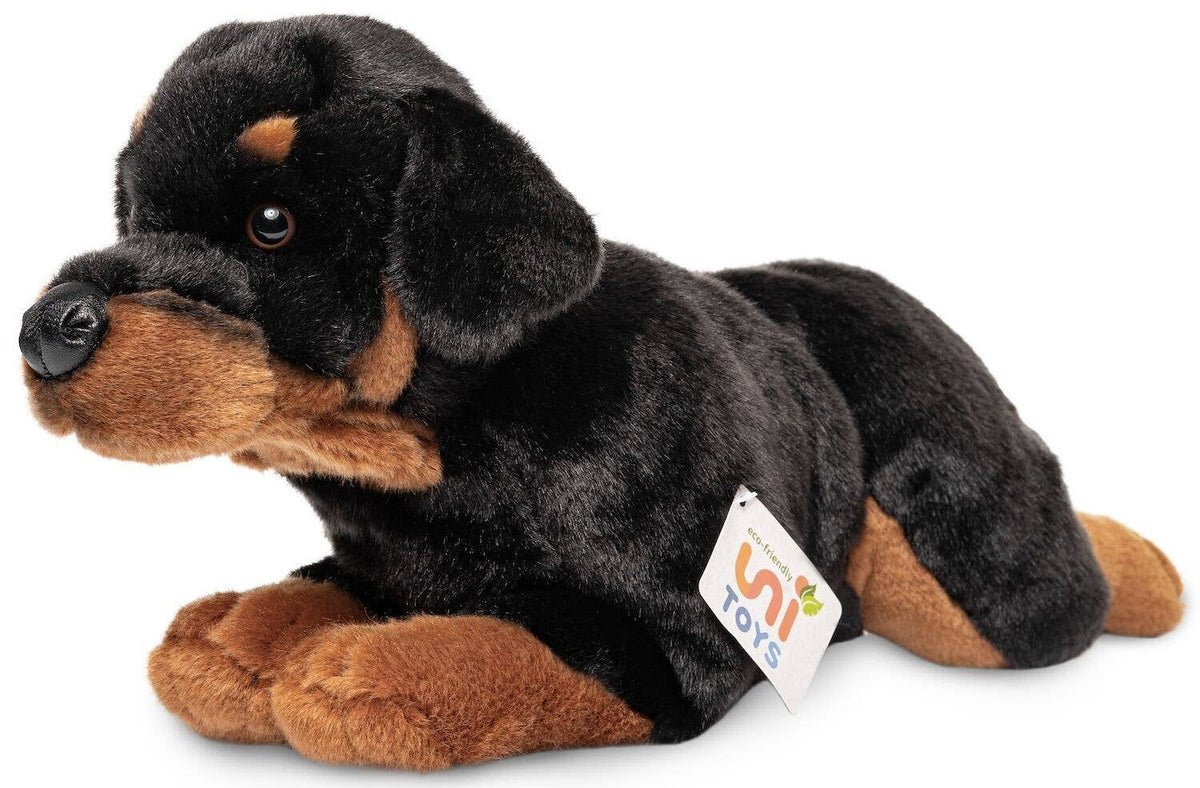 Lying Rottweiler plush toy
