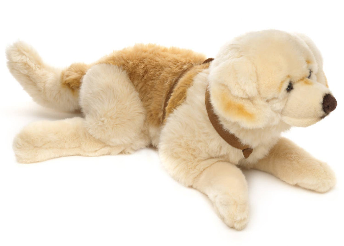 Peluche golden retriever couché avec harnais