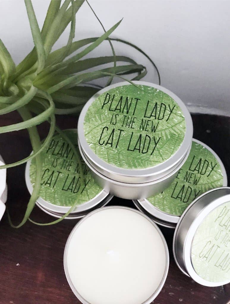Candela profumata per donna con erbe aromatiche
