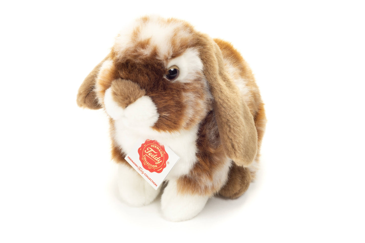 Dark brown and white sitting rabbit plush toy