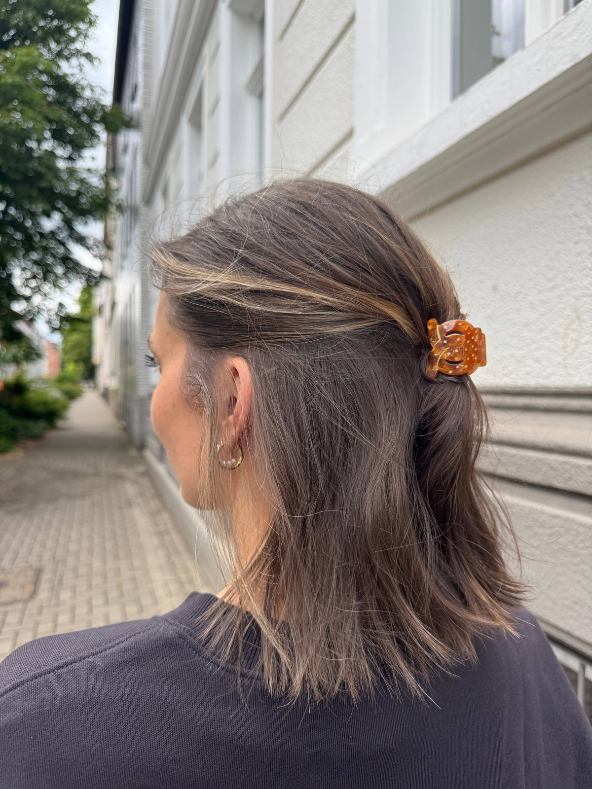 Piccola molletta per capelli a forma di pretzel