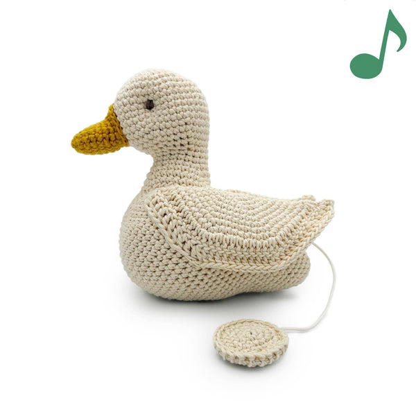 Knitted musical duck plush