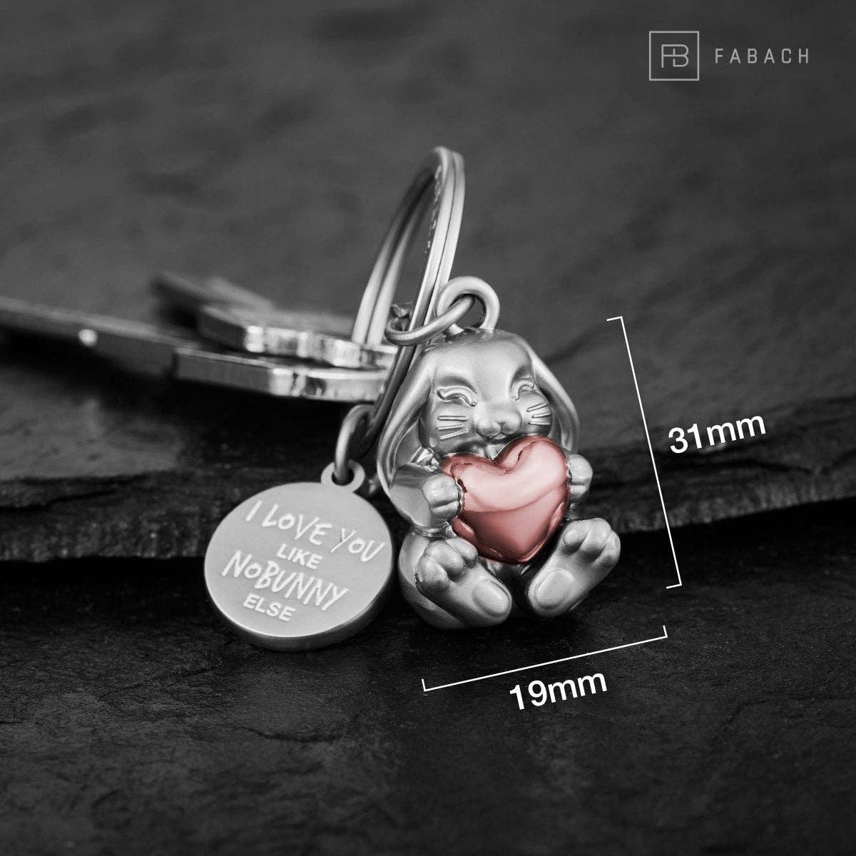 "I love you like no bunny else" bunny-shaped keychain with engraving. Cute lucky charm with a heart