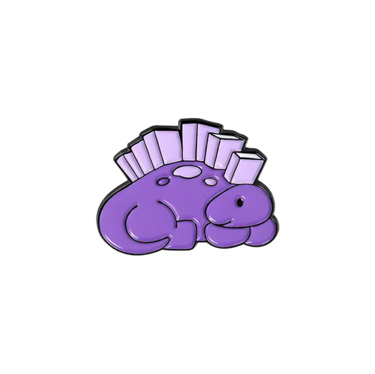 Pin's Spinosaure Bibliophile