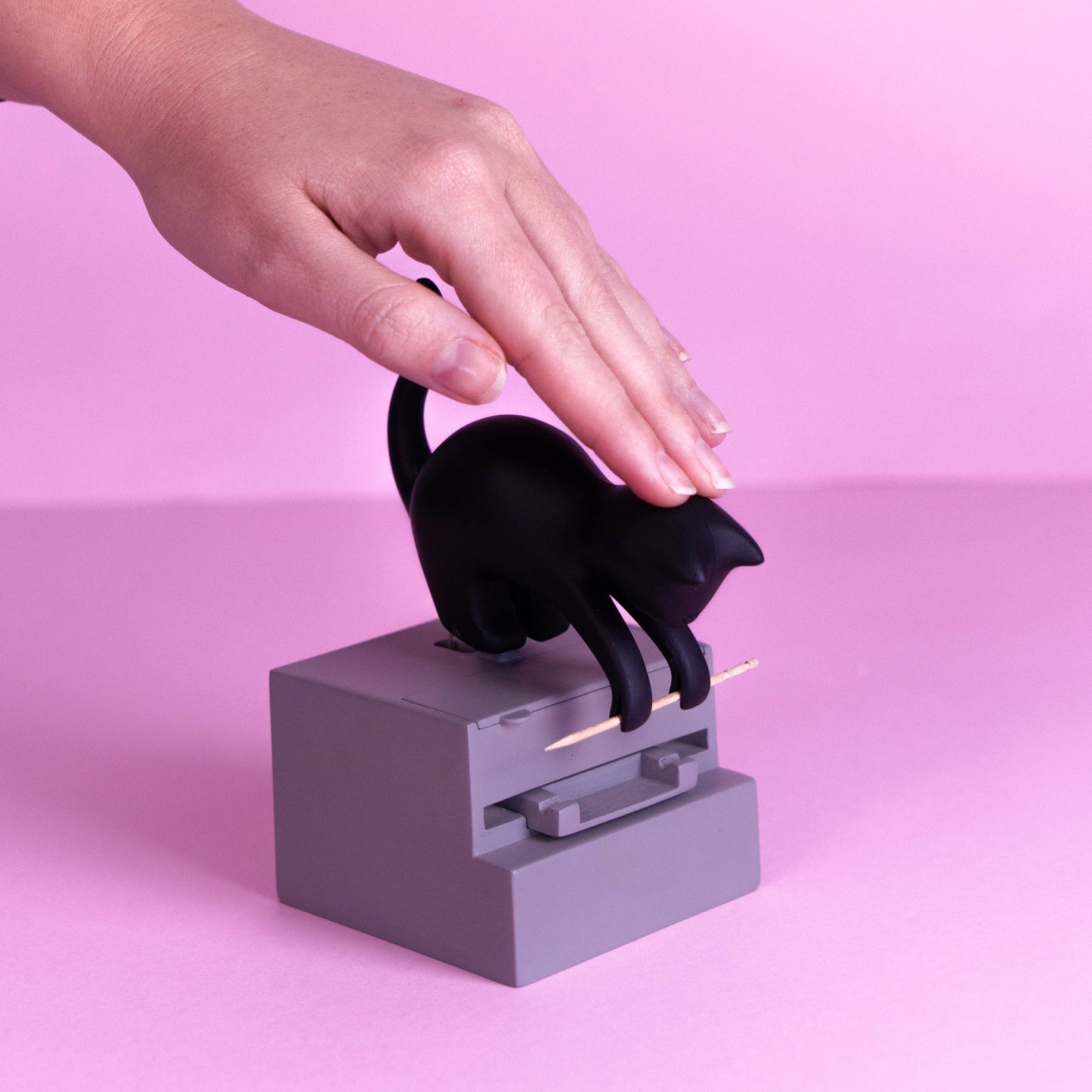 Frisky toothpick holder
