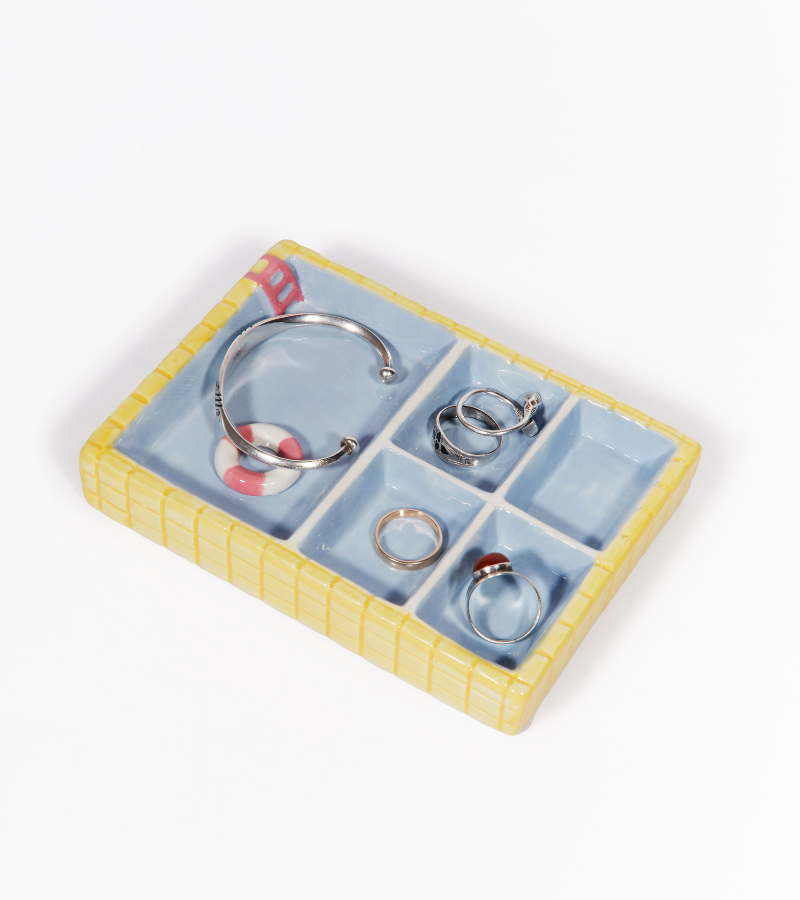 Poolside jewelry stand