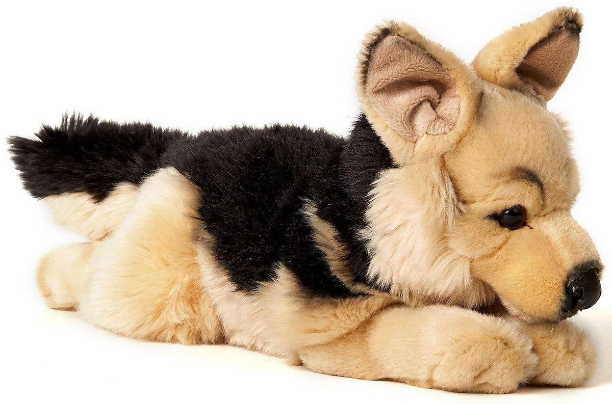 German shepherd lying plush toy