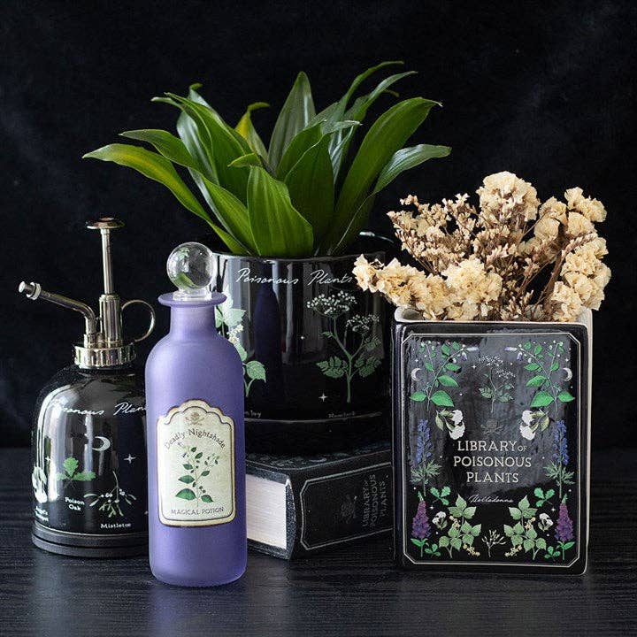 Gothic botanical book-shaped vase of poisonous plants