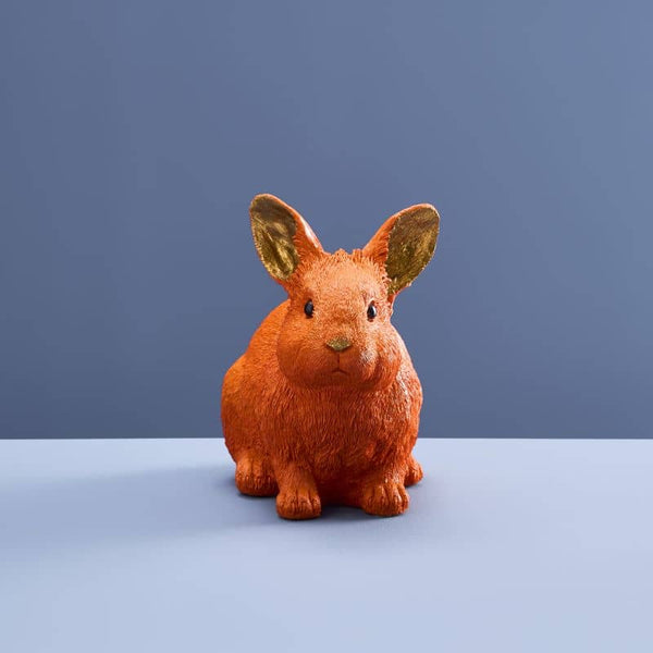 Thrifty rabbit, orange polyurethane resin, 21 x 11 x 16 cm