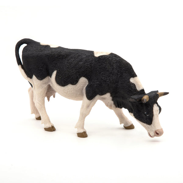 Figurine Vache noire et blanche broutant Papo - animal de la ferme