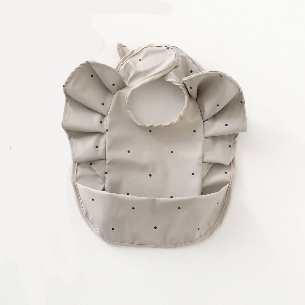 Dusty grey waterproof ruffled bib with polka dots
