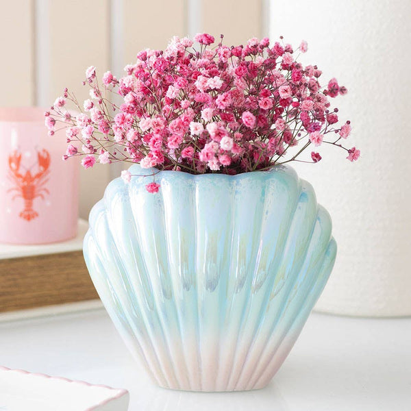 Vaso per fiori a forma di conchiglia iridescente