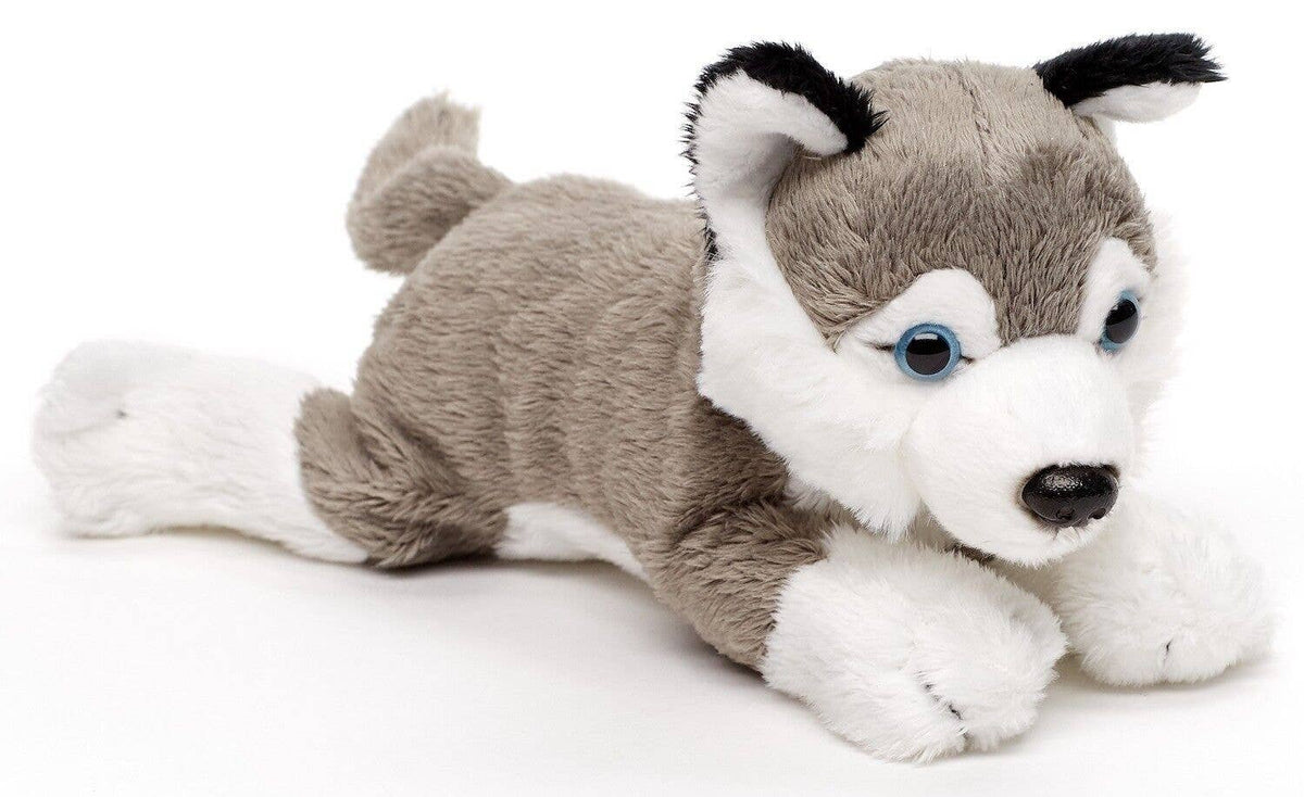 Peluche husky gris allongé