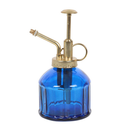 Petit vaporisateur en verre bleu pour plantes