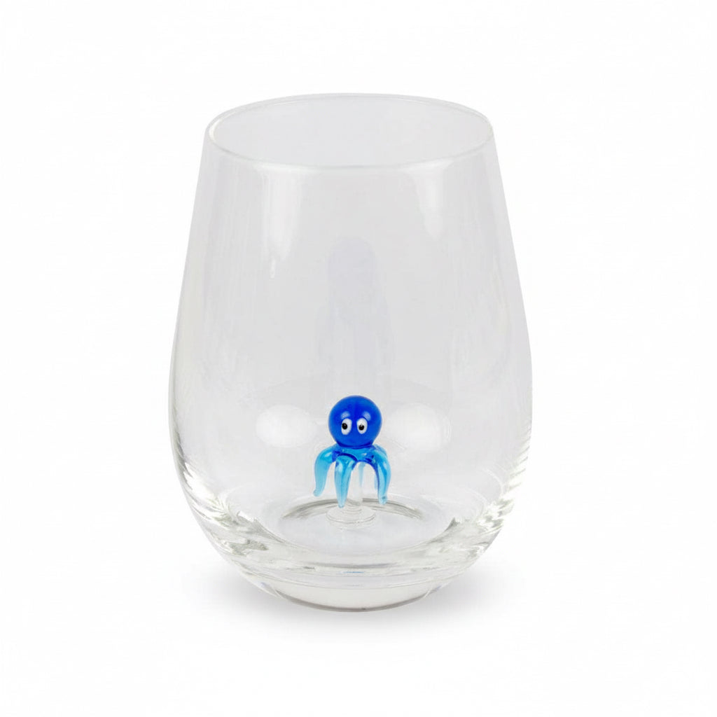 Drinking glass with a small octopus