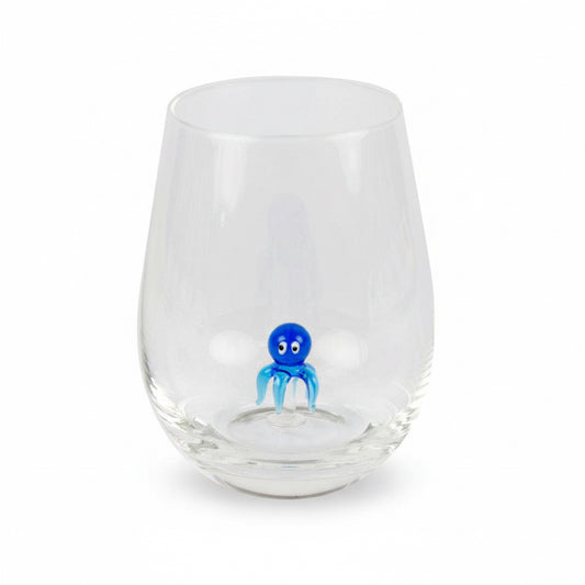 Drinking glass with a small octopus