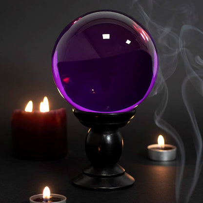 Large purple crystal ball on a stand