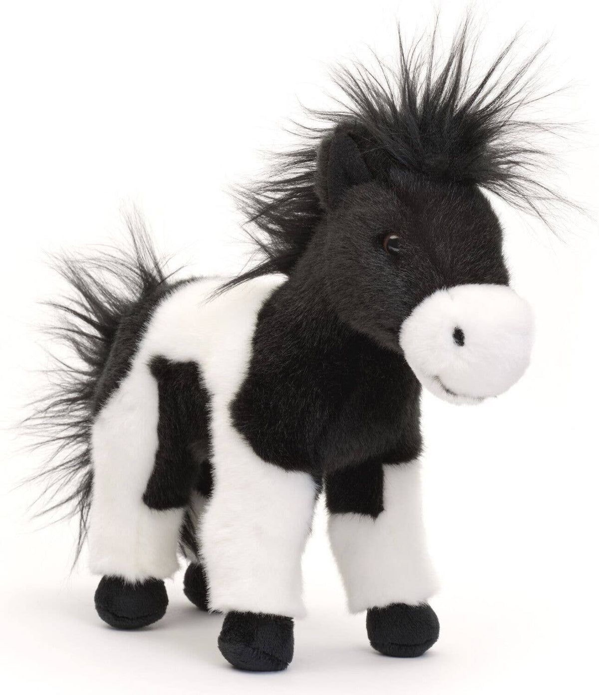 Standing black and white horse plush toy
