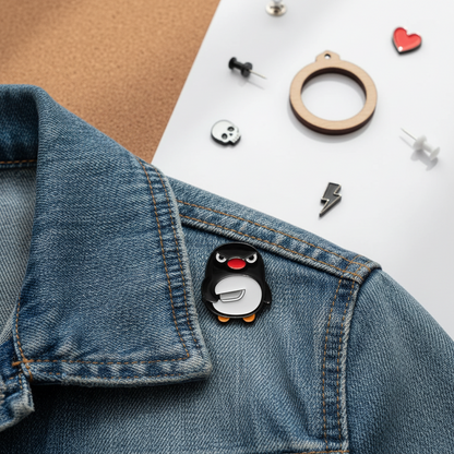 Pin's Pingouin avec Couteau