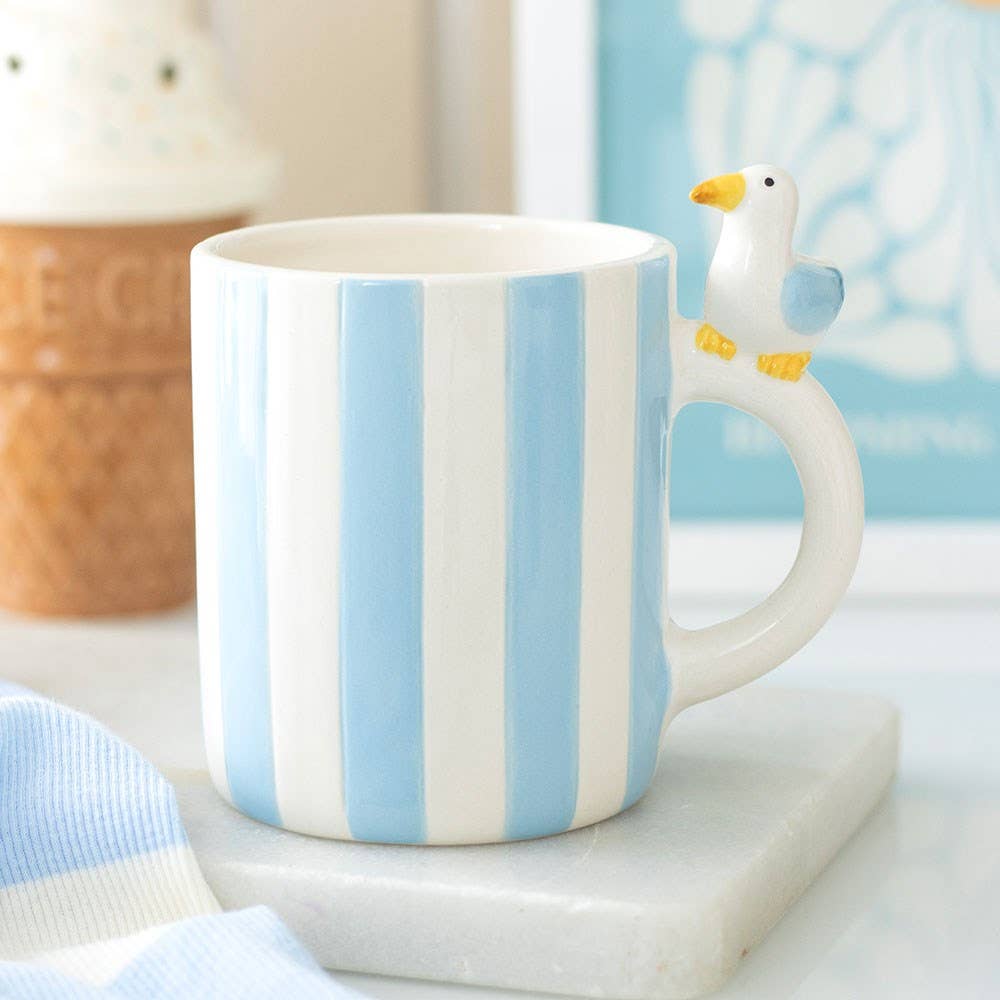 Tazza a forma di gabbiano a strisce