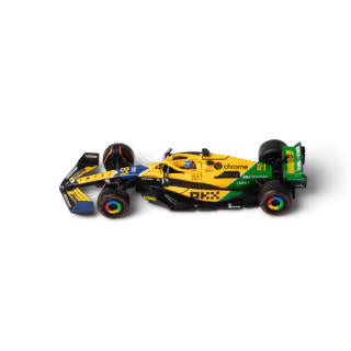 1:43 F1 MCLAREN MCL38 2024 WITH HELMET PIRELLI SENNA LIVERY