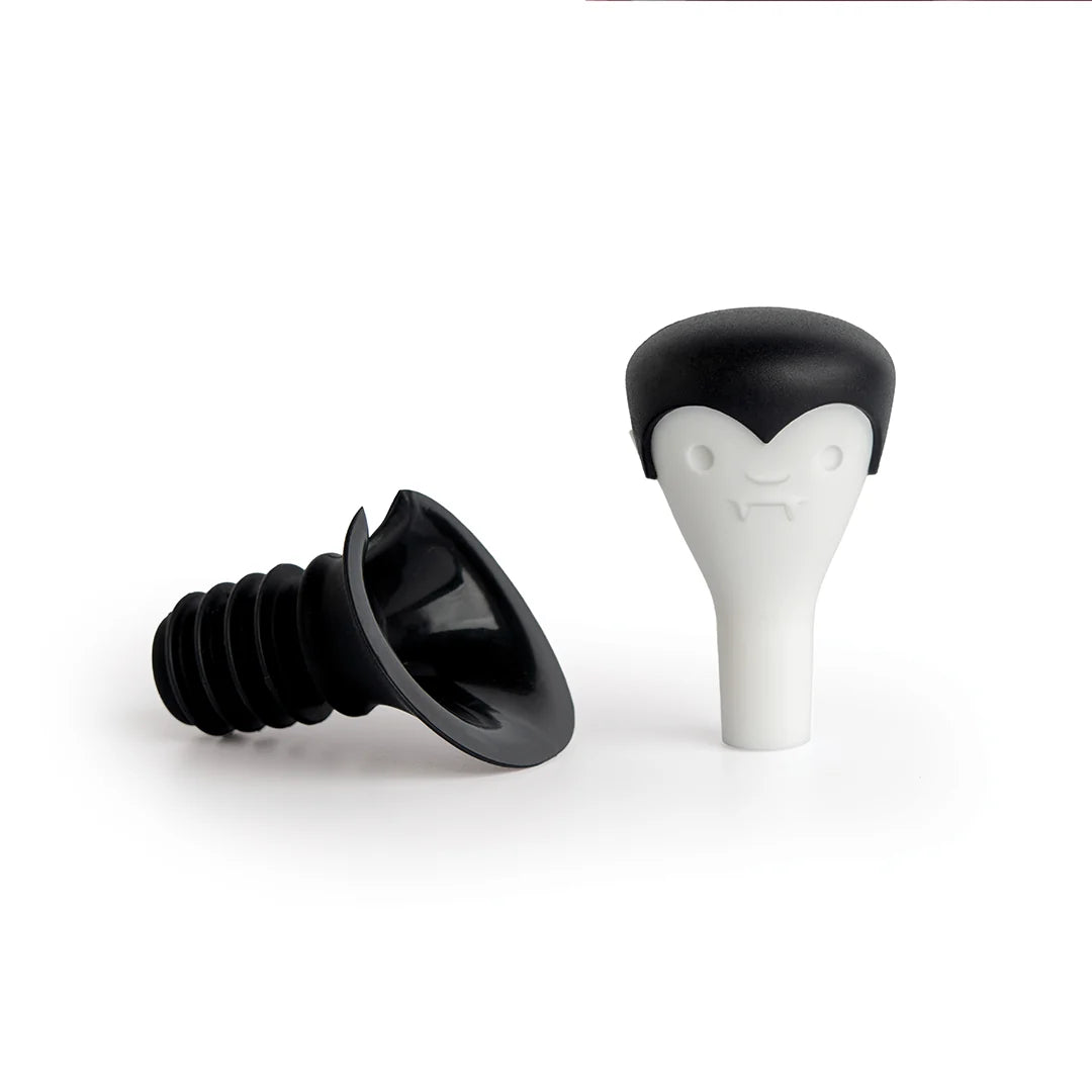 Count Corkula bottle stoppers have vampire fangs and black caps, perfect for wine enthusiasts.