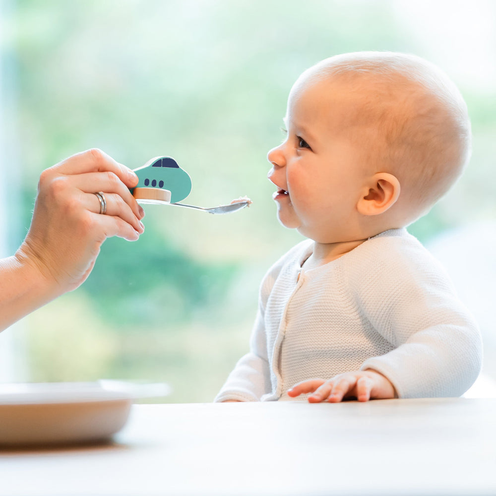 Cucchiaio per bambini a forma di aeroplano turchese