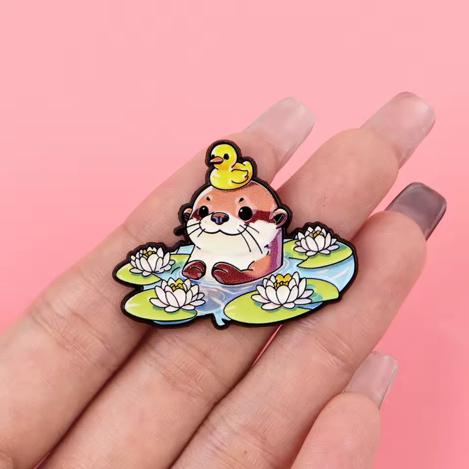 Pin’s Loutre et Caneton sur Nénuphars