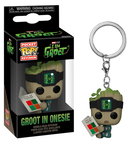 pop keychain groot en pyjama avec un livre