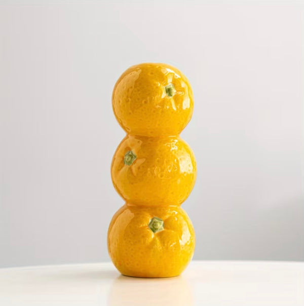 Vase of Oranges