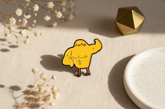Pin’s Canard Jaune Musclé