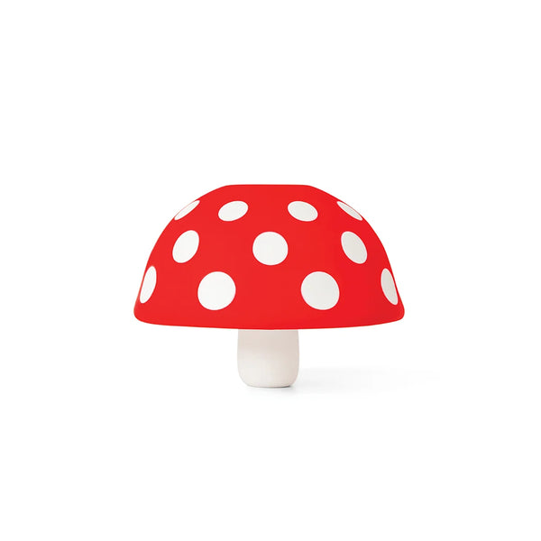 Fungilicious: Red mushroom with white dots, set on a bright white backdrop.