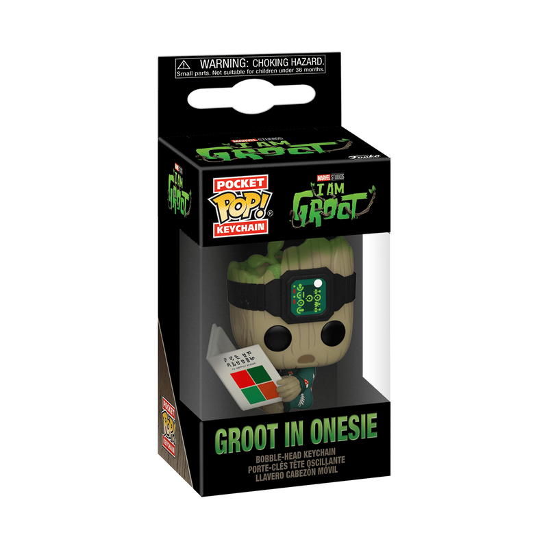 pop keychain groot en pyjama avec un livre