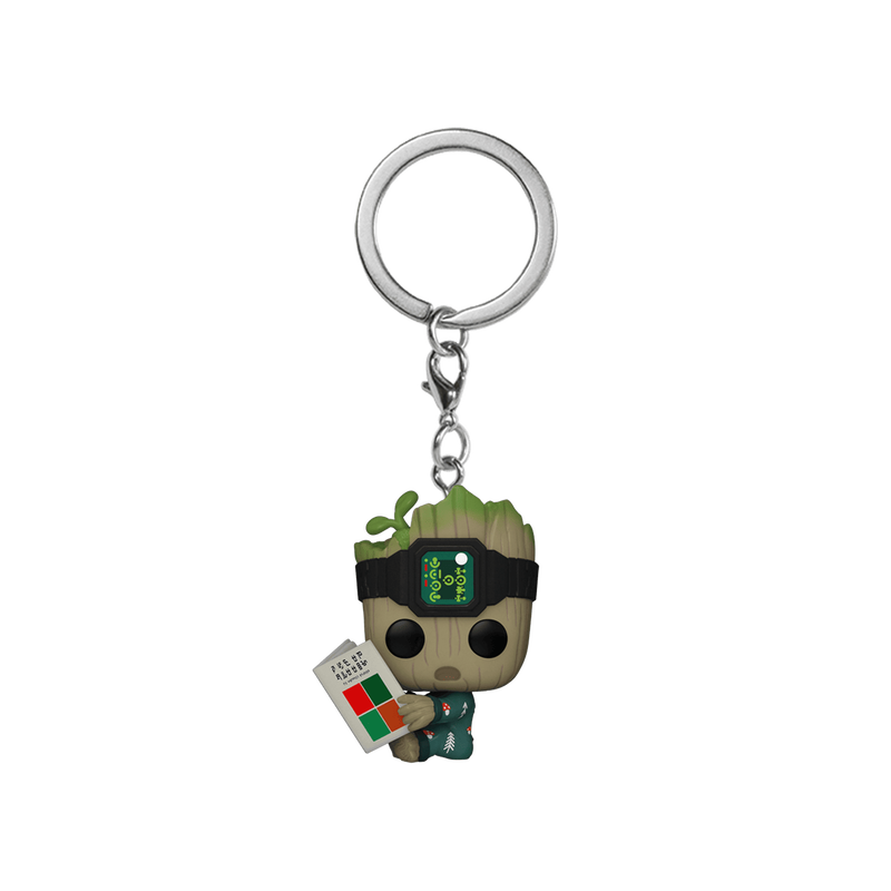 pop keychain groot en pyjama avec un livre