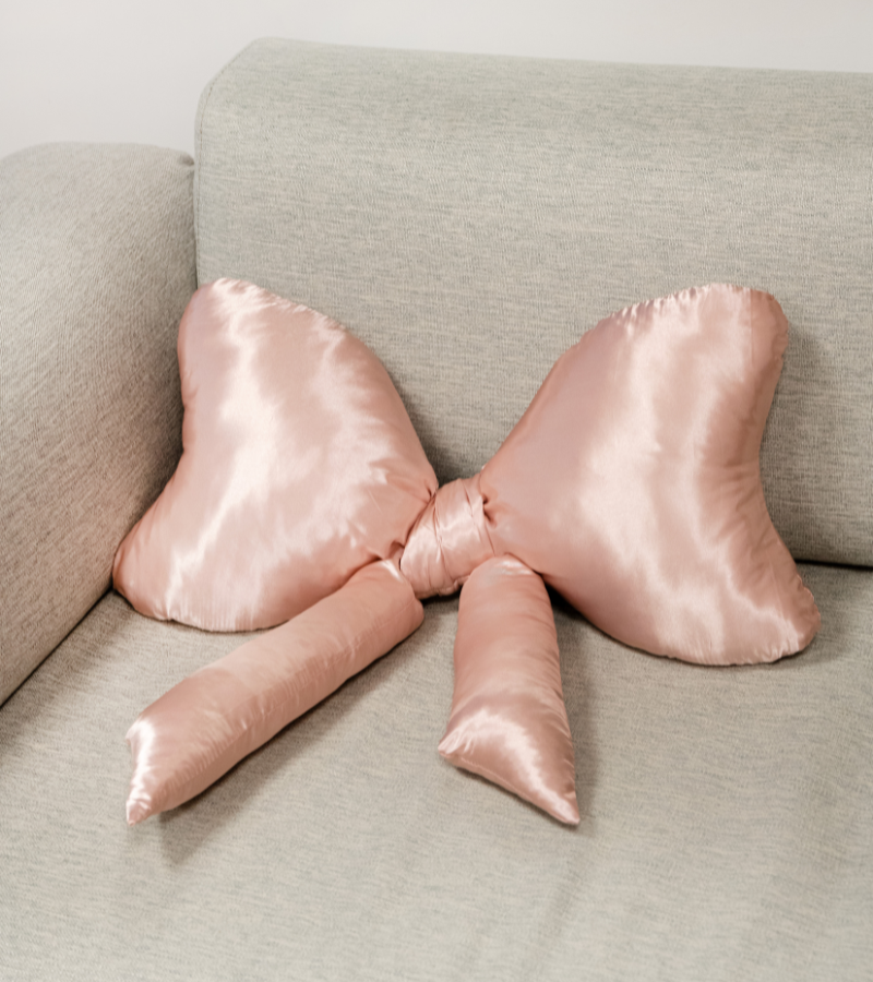 Satin knot cushion