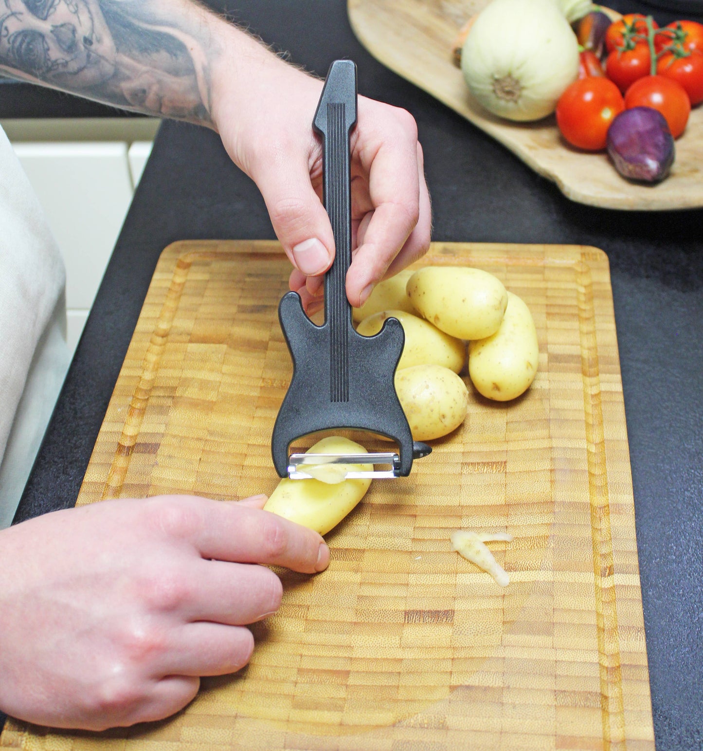 Electric guitar vegetable peeler