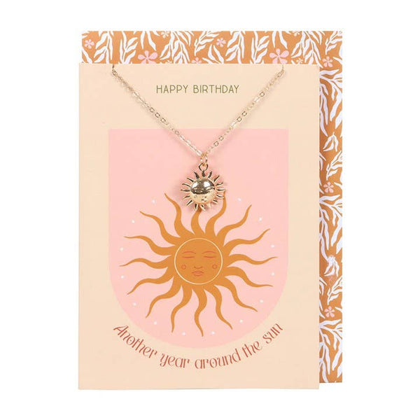 Sun necklace on a birthday card