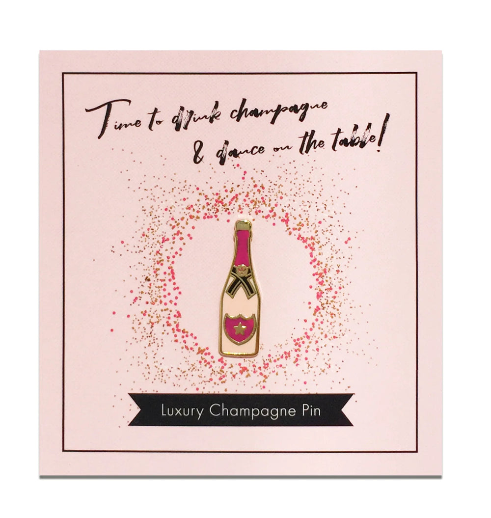 Spilla a forma di bottiglia di champagne rosé