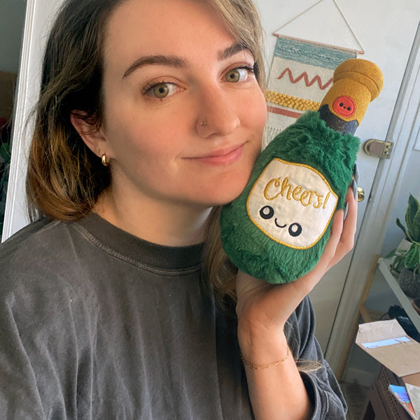 Peluche Boozy Buds Squishable – Bouteille de Champagne Shot-Sized
